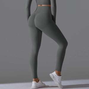 Detailed back view of dark grey seamless high waisted peach lift yoga leggings and top