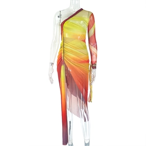 Detail of ruched mesh texture and orange gradient pattern on one-shoulder dress