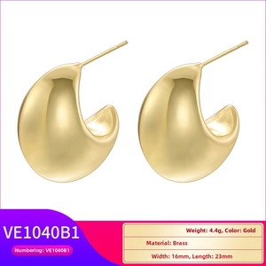 Detailed view of hollow teardrop 18K gold plated brass earrings with size specifications