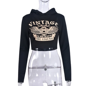 Detail of black cropped hoodie with vintage legend graphic print and hooded neckline