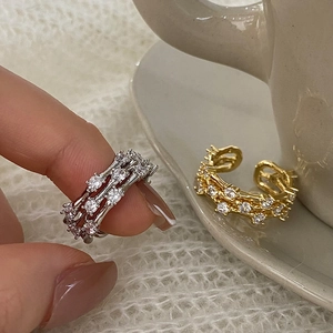 Three-layer adjustable rings in gold and silver with sparkling cubic zirconia accents