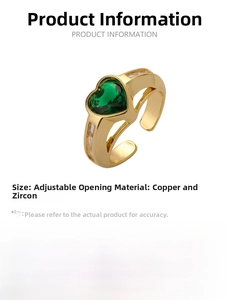 Close-up of adjustable copper gold plated ring with large green heart zircon stone