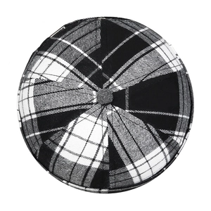 Classic black and white checkered flat cap with vintage 6-panel stitched crown design