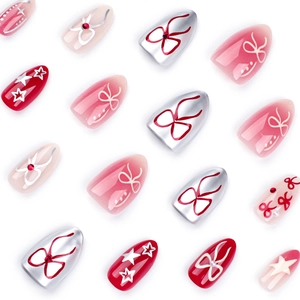 Sweet ins style almond press-on nails with bow designs and silver stars on white background