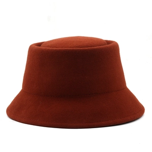 Classic rust red wool felt bucket hat for women with minimalist retro autumn design