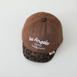Detailed embroidery of Los Angeles 1920 on a vintage brown suede baseball cap