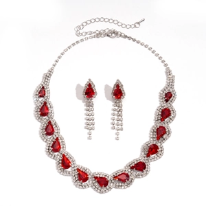 Vintage style jewelry set featuring red pear-cut crystal necklace and teardrop earrings