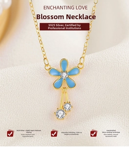 Macro detail of S925 sterling silver flower necklace with blue glaze petals and zircons