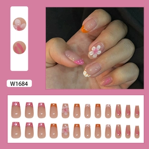 Kit 24 faux ongles fleurs de pêcher de forme cercueil avec designs roses variés