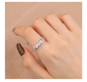 Macro shot of s925 silver ring featuring five rectangular cut cubic zirconia diamonds