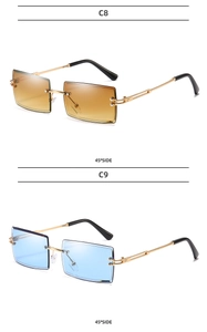 45-degree side view of rimless rectangular sunglasses in amber and light blue lenses
