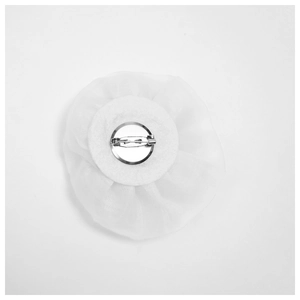 Back view of 3D white fabric rose brooch with silver safety pin and felt backing