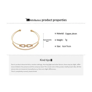 Macro detail of gold double-layer zircon cuff bracelet with chic link design