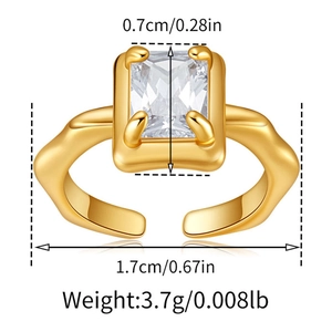 Detail showing dimensions of gold bow-shaped ring with emerald-cut cubic zirconia