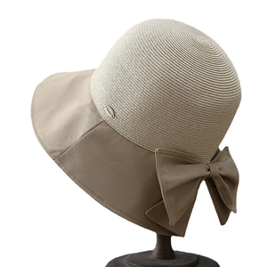 Women's summer straw sun hat with stylish khaki bow and elegant color stitching