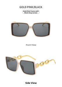 Detail view of square oversized sunglasses featuring gold chain temples and pink frames
