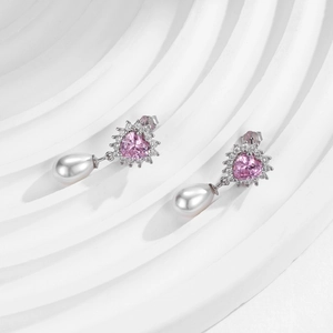 Elegant S925 silver drop earrings featuring pink heart stones and waterdrop pearls