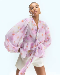 Floral chiffon blouse with pink-purple tie-neck details and romantic ruffled long sleeves
