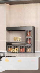 Detail showing wall-mounted spice rack with tiered sections for bottles and jars