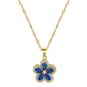 Gold titanium steel flower necklace with blue crystal petals and micro-pave crystals