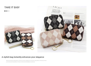 Close-up of argyle pattern card holder with gold zipper and keychain attachment