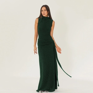Detail of dark green sleeveless maxi dress with shimmer fabric and elegant waist tie