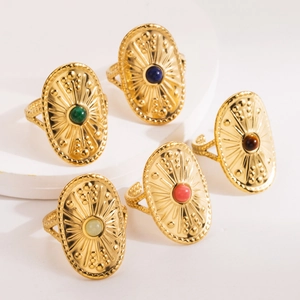 Vintage stainless steel open ring set with sunburst patterns and colorful natural stones