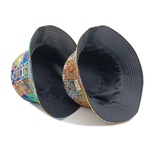 Bohemian reversible bucket hat with colorful sunflower patterns and black inner fabric