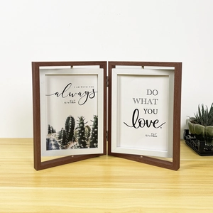 Detail of 5x7 inch double folding wood grain rotating photo frame with metal hinges