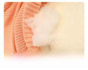 Close-up of fluffy PP cotton filling and soft knit fabric of the dog plush pillow