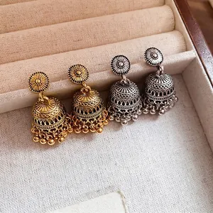 Vintage Jhumka earrings in gold and silver finish with sunburst studs and floral bells