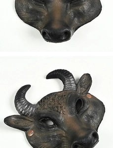 Close-up of realistic buffalo mask featuring PU foam texture and spiral horn details