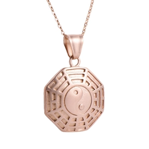 Minimalist rose gold stainless steel Tai Chi Yin Yang pendant necklace on white background