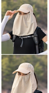 Detail of khaki outdoor sun hat featuring breathable face mesh and mountain logo embroidery