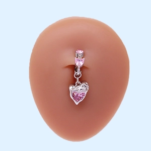 Close-up of a silver belly ring featuring two pink heart-shaped stones on skin