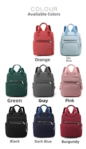 Quilted nylon backpack in eight vibrant colors featuring front zipper pocket and side slots