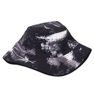 Detail shot of feather pattern and ink splash texture on breathable fabric bucket hat