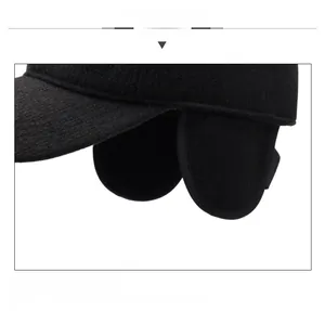 Detail of winter men's duckbill cap showing fold-down ear flaps and warm fleece lining