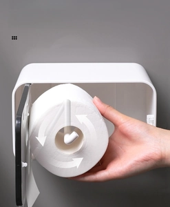 Detail of wall-mounted waterproof tissue box interior with smooth rolling spindle for paper