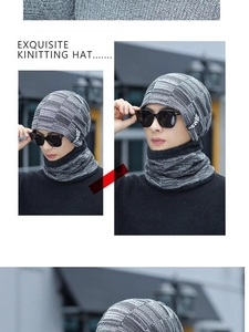 Close-up of thick knitted winter hat and neck warmer with detailed texture and HSWB label