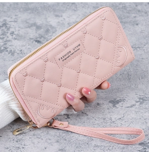 Pink quilted PU leather wallet featuring bear embroidery and a gold zipper closure