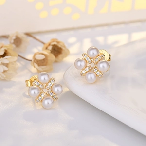 Elegant S925 silver needle flower pearl earrings with champagne gold finish and zircons
