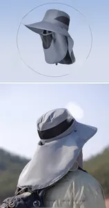 Detail of grey outdoor sun hat featuring breathable mesh vents and protective neck flap