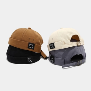 Canvas Miki Hat with heart embroidery label in multiple colors and adjustable buckle
