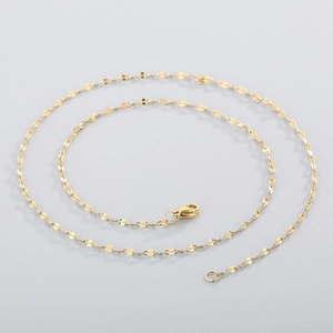 Detailed view of a gold stainless steel lip chain necklace with a secure lobster clasp