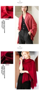 Detail view of cotton linen scarves with fringe edges in rose red and wine red colors