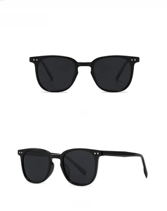 Classic black square polarized sunglasses with silver rivets in front and side views