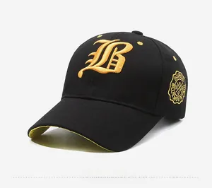 Close-up of black cotton baseball cap with yellow embroidered B and side badge detail