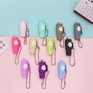 Colorful mini cup keychains with daisy charms and silver bead chains in various hues