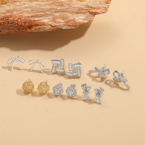 French vintage style bow and rhinestone earring set in gold and silver finish